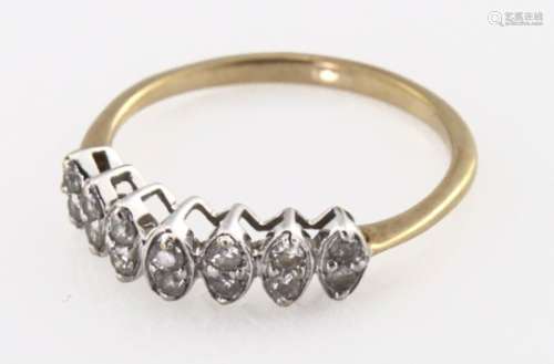 Yellow metal (tests 9ct) 14 stone Diamond Ring size P weight 1.9g