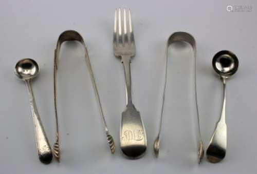 Mixed lot of Georgian silver items comprising two pairs of sugar tongs, two condiment spoons and a