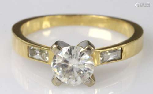 18ct yellow gold ring set with single cubic zirconia and baguette shoulders, finger size P, weight