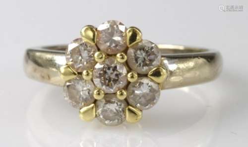 18ct yellow gold seven stone cluster diamond ring with known total diamond weight of 1ct, finger