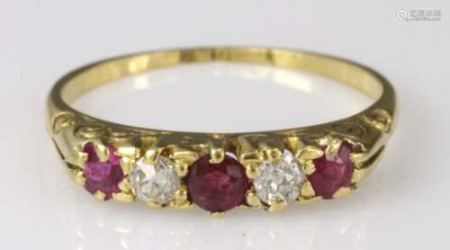 18ct ruby and diamond five stone graduated ring, finger size N, weight 2.4g
