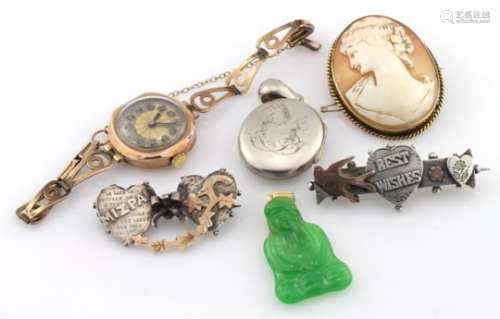 Mixed lot consisting of 9ct mechanical ladies wrist watch, weight 16.9g. 9ct cameo brooch, weight