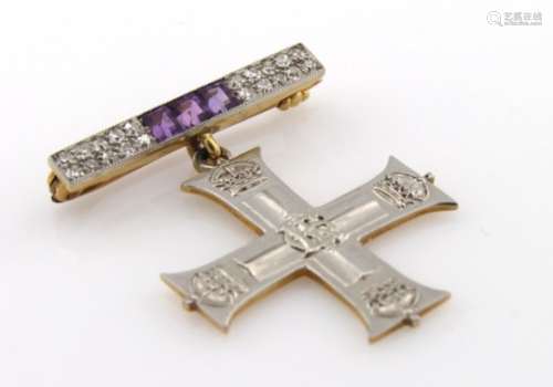 Gold Military Cross Brooch on a Diamond and Amethyst set suspender weight 6.2g