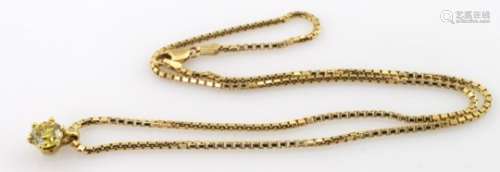 Yellow diamond (approx 1ct) on an 18ct yellow gold chain (approx 16 inches). Total weight 7.8g.