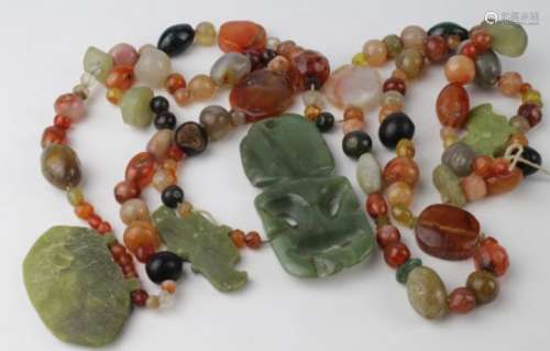 Two bead necklaces, each consisting of coloured stones of various sizes, length 66cm & 62cm