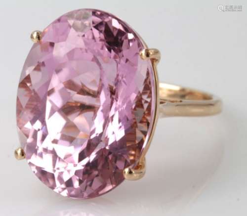 14ct rose gold single stone ring set with natural oval Brazillian Kunzite weighing 25.03ct. Finger