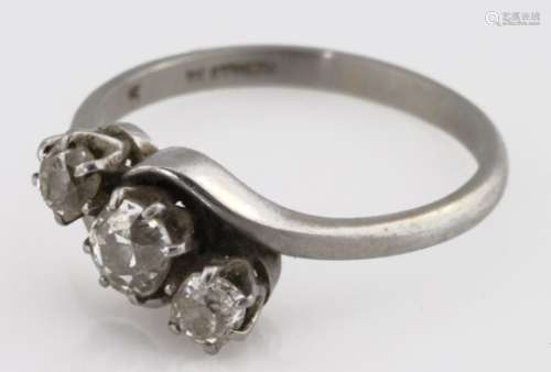 Platininum three stone diamond ring, the central stone (approx .45ct) flanked by two smaller