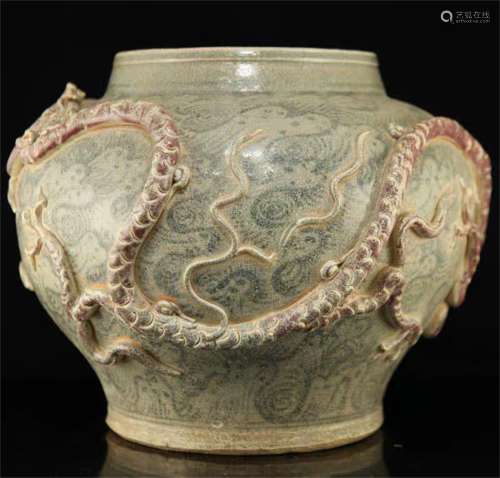 A Chinese Celadon Glazed Porcelain Jar