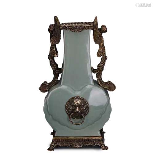 A Chinese Celadon Glazed Porcelain Vase with Bronze Inlaid