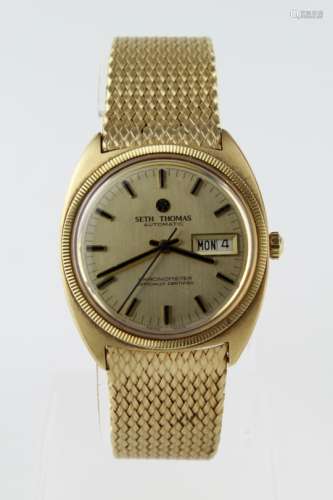 Gents 14ct cased Seth Thomas automatic wristwatch, the gilt dial with gilt baton markers and day/