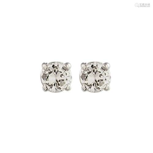 Pendientes en oro blanco 14K con diamante.