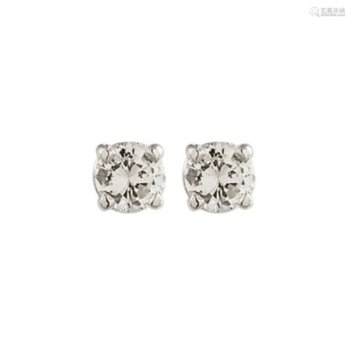 Pendientes en oro blanco 14K con diamante.