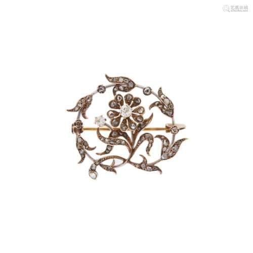 Broche diseño floral en oro y vistas en plata con diamantes, ppios. del s.XX.