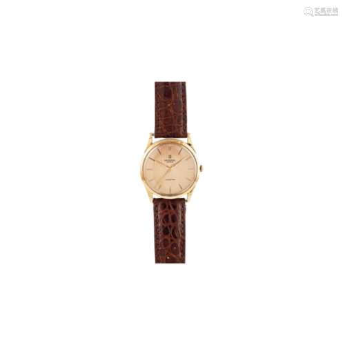 Reloj Universal Genève de pulsera para caballero. En oro y correa de piel no original.