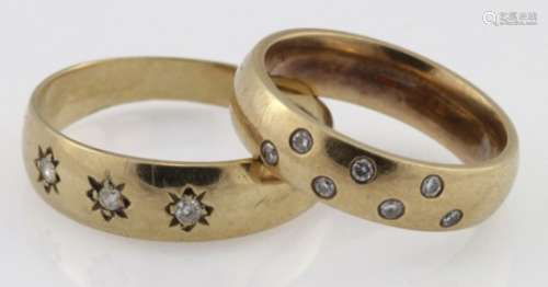 Two 9ct yellow gold diamond set band rings, weight 7.6g