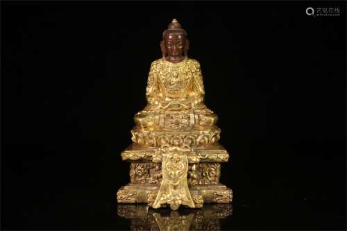 A Chinese Gilt Bronze Figure of Buddha