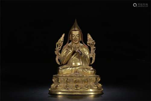 A Chinese Gilt Bronze Figure of Buddha