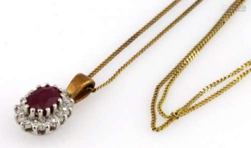 9ct yellow gold ruby and diamond oval cluster pendant and fine chain, weight 1.8g