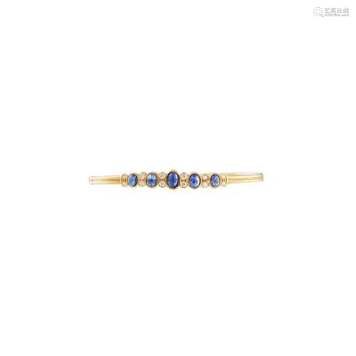 Pulsera esclava en oro con zafiros azules y parejas de diamantes.