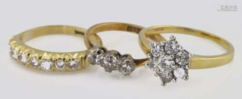 Three Diamond set 18ct Gold Rings weight 9.4g