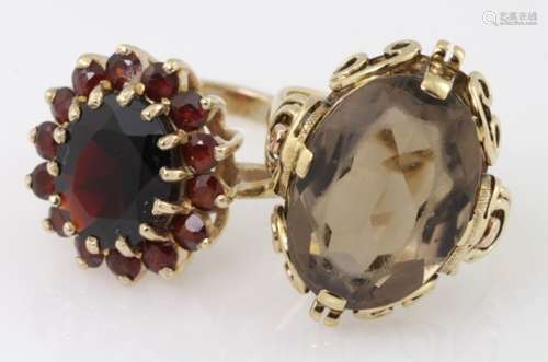 Two 9ct dress rings, one garnet cluster and one smoky quartz, weight 11.6g