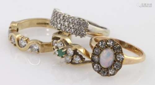 Four 9ct gold paste and cz set rings, weight 11.5g