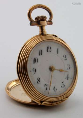 Ladies 14ct cased open face pocket watch, the white dial with black arabic numerals. Approx 32mm
