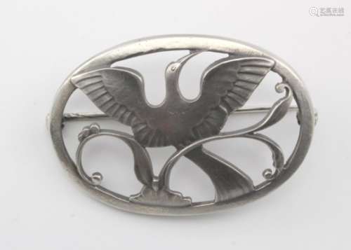 Silver Georg Jensen oval brooch (no. 238), depicting a bird in flight, makers marks stamped to