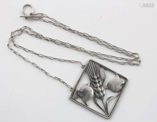 Silver Georg Jensen square pendant (no. 93), designed by Arno Malinowski, depicting two robins &