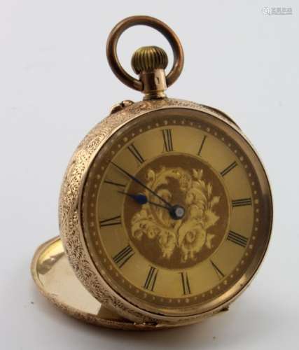Ladies 14ct cased fob watch, the gilt dial with black roman numerals and foliage decoration.