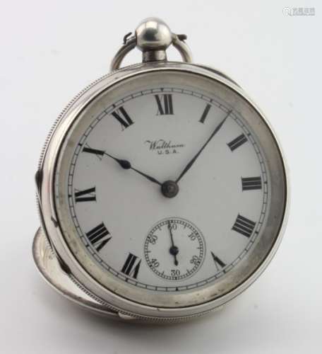 Gents Silver open face pocket watch by Waltham . Hallmarked Birmingham 1922. The white dial with