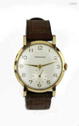 Gents 9ct cased wristwatch by Garrard circa 1957. The cream dial with gilt arabic numerals and