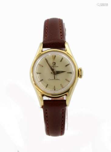 Ladies 18ct cased Omega seamaster circa 1958 / 59. the light gold dial with gilt baton markers, on a