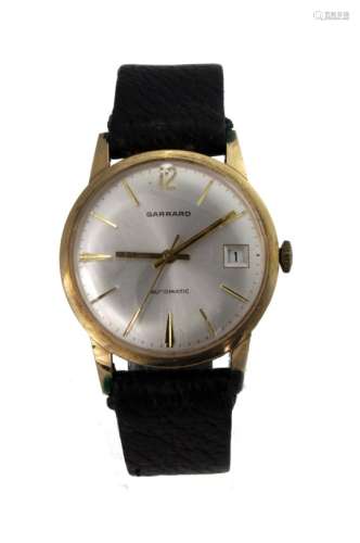 Gents 9ct cased automatic wristwatch by Garrard. The dial with gilt baton markers and date