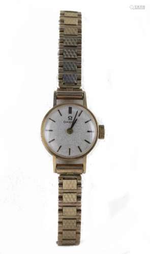 Ladies 9ct cased Omega wristwatch circa 1972. The silvered 18mm dial with gilt baton markers. On a