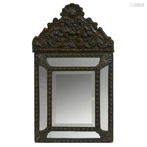 A Baroque style pressed metal mirror, 20th century