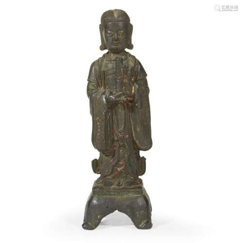 A Chinese bronze figure of a female attendant, Ming