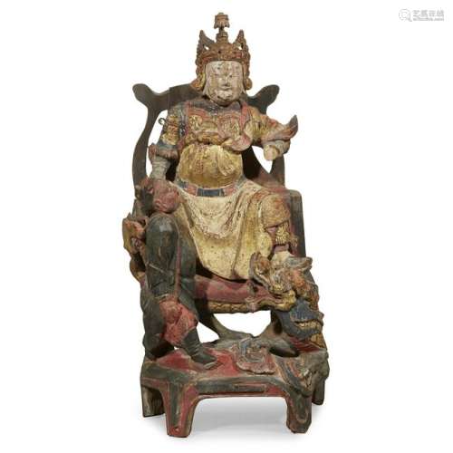A Chinese carved wood warrior deity,