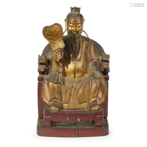 A Chinese carved and gilt-lacquered wood figure of a