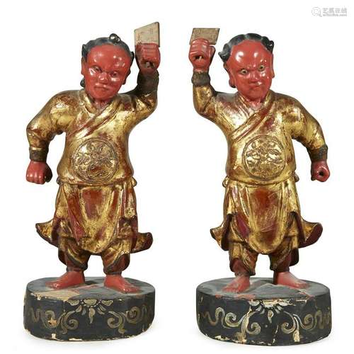 A pair of Chinese lacquered and gilt wood figures, 19th