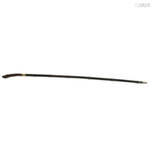 A Chinese bamboo and carved wood cane,