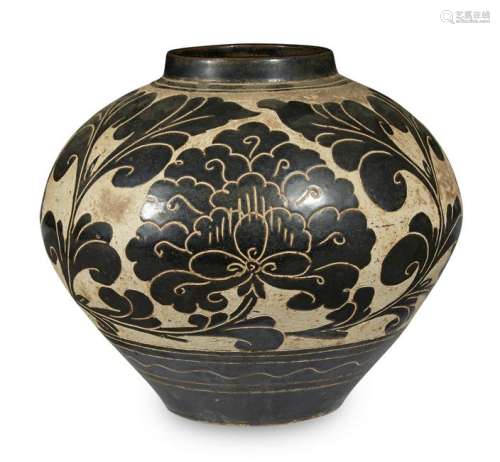 A large Chinese Cizhou-style carved jar,
