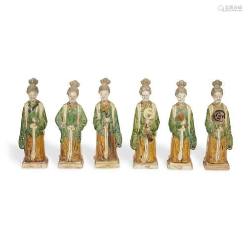 A group of six Chinese pottery female attendants,