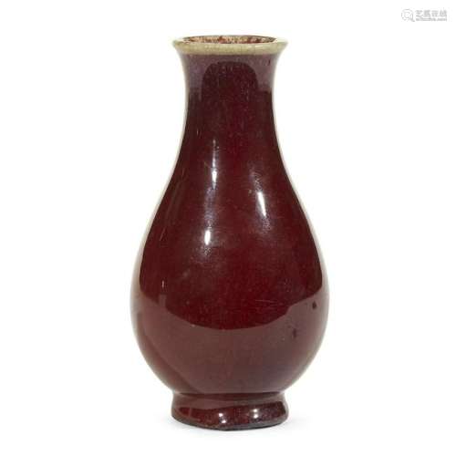 A Chinese copper-red glazed small bottle vase, Qing
