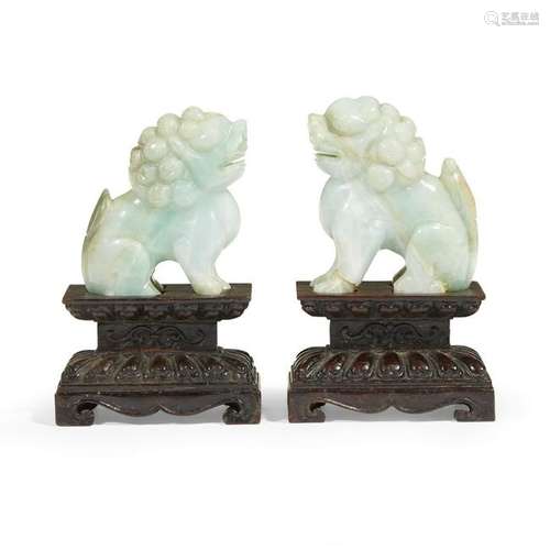 A pair of small Chinese jadeite fu lions, 20th century