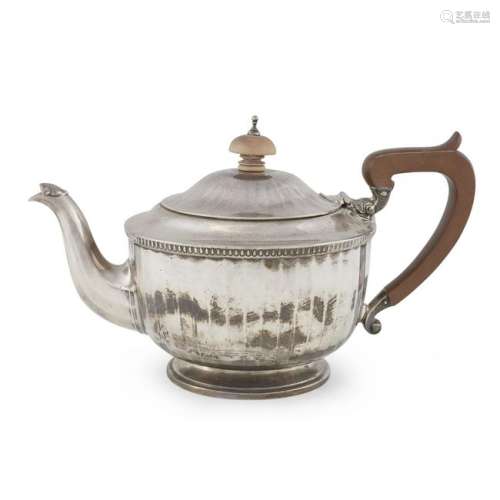 An English sterling teapot with wooden handle, Adie