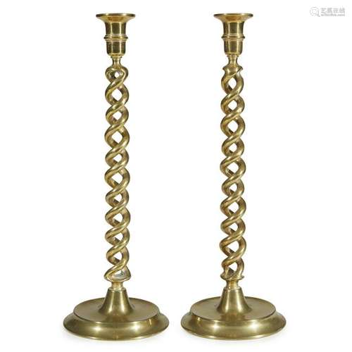 A pair of English brass spiral twist candlesticks,