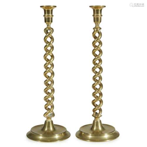 A pair of English brass spiral twist candlesticks,