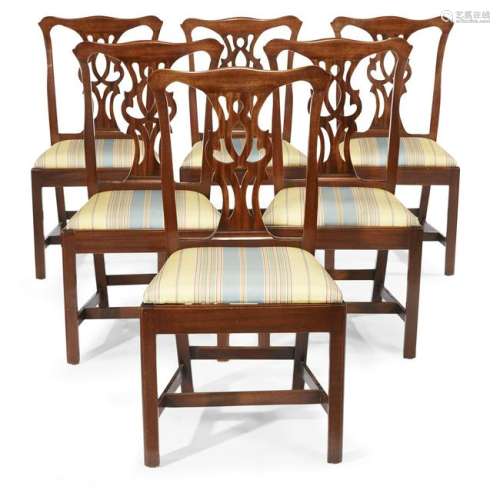 A set of six George III style mahogany dining chairs,