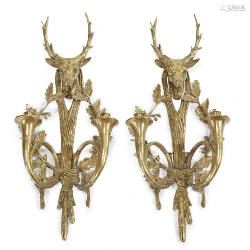 A pair of Louis XVI style gilt-bronze hunt themed